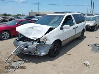 2002 Toyota Sienna LE z VIN 4T3ZF13C82U472835, wystawiony jako IAAI lot #42365136 z przebiegiem 293 372 mil mil oraz . Historia ofert i sprzedaży dostępna na DreamBid. Obrazek 2.