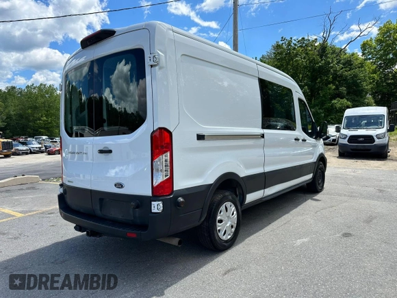 2020 Ford Transit Cargo z VIN 1FTBR1CG3LKB36452, wystawiony jako Copart lot #58659545 z przebiegiem 171 504 mil mil oraz Tytuł czysty. Historia ofert i sprzedaży dostępna na DreamBid. Obrazek 3.
