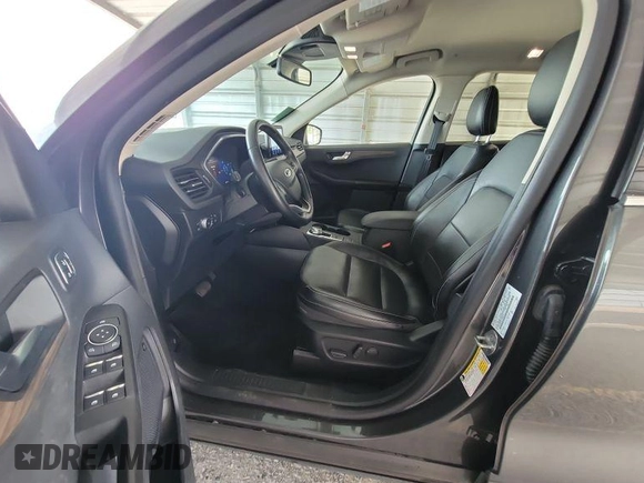 2020 Ford Escape Titanium Hybrid with VIN 1FMCU0DZ2LUB82013, listed as a IAAI auction lot 42727391 with 92,623 mi miles and . Bid and sale history available at DreamBid. Image 10.