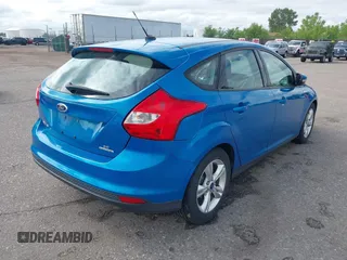 2014 Ford Focus SE z VIN 1FADP3K23EL396126, wystawiony jako IAAI lot #42380189 z przebiegiem 143 298 mil mil oraz . Historia ofert i sprzedaży dostępna na DreamBid. Obrazek 4.