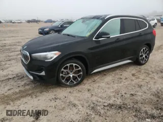 2021 BMW X1 xDrive28i with VIN WBXJG9C07M5T06155, listed as a Copart auction lot 84222754 with 18,466 mi miles and Salvage Title. Bid and sale history available at carsss.com. Image 1.
