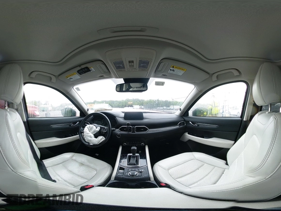 2019 Mazda CX-5 Grand Touring with VIN JM3KFBDM8K0693622, listed as a IAAI auction lot 42503818 with 60,812 mi miles and . Bid and sale history available at DreamBid. Image 18.