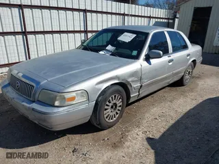 2007 Mercury Grand Marquis LS with VIN 2MEFM75V77X601170, listed as a IAAI auction lot 41517369 with 210,800 mi miles. Bid and sale history available at carsss.com. Image 17.