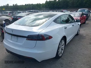 2021 Tesla Model S Long Range with VIN 5YJSA1E57MF428512, listed as a IAAI auction lot 42511020 with 29,611 mi miles and . Bid and sale history available at DreamBid. Image 4.