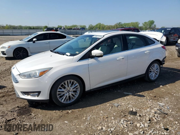 2018 Ford Focus Titanium with VIN 1FADP3J21JL294061, listed as a Copart auction lot 53827375 with 194,577 mi miles and Salvage title. Bid and sale history available at DreamBid. Image 1.