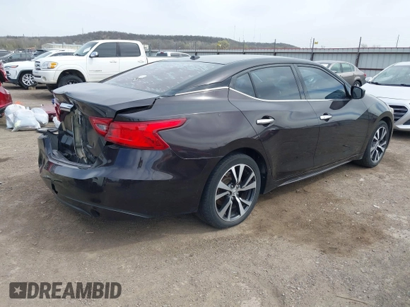 2016 Nissan Maxima SL with VIN 1N4AA6AP3GC393930, listed as a IAAI auction lot 41829151 with 202,255 mi miles and . Bid and sale history available at DreamBid. Image 4.