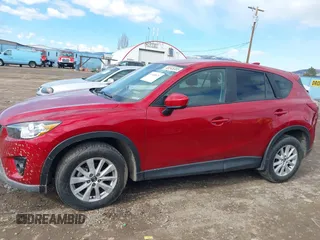 2014 Mazda CX-5 Touring with VIN JM3KE2CY3E0355296, listed as a IAAI auction lot 41688625 with 164,390 mi miles. Bid and sale history available at carsss.com. Image 14.