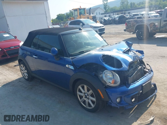 2013 MINI Convertible S with VIN WMWZP3C5XDT705613, listed as a IAAI auction lot 42392748 with 87,477 mi miles and . Bid and sale history available at DreamBid. Image 1.