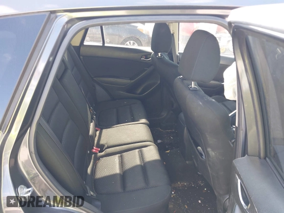 2015 Mazda CX-5 Touring with VIN JM3KE2CY9F0468199, listed as a IAAI auction lot 42099253 with 110,909 mi miles and . Bid and sale history available at carsss.com. Image 8.