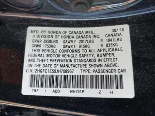 2018 Honda Civic Si Sedan with VIN 2HGFC1E59JH708967, listed as a IAAI auction lot 41697160 with 123,107 mi miles. Bid and sale history available at carsss.com. Image 9.