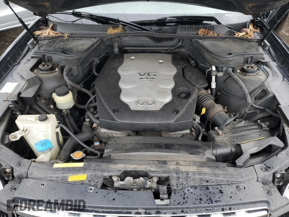 2005 Infiniti FX z VIN JNRAS08W05X217666, wystawiony jako Copart lot #37808544 z przebiegiem 172 472 mil mil oraz Szkoda całkowita • Salvage title. Historia ofert i sprzedaży dostępna na DreamBid. Obrazek 11.