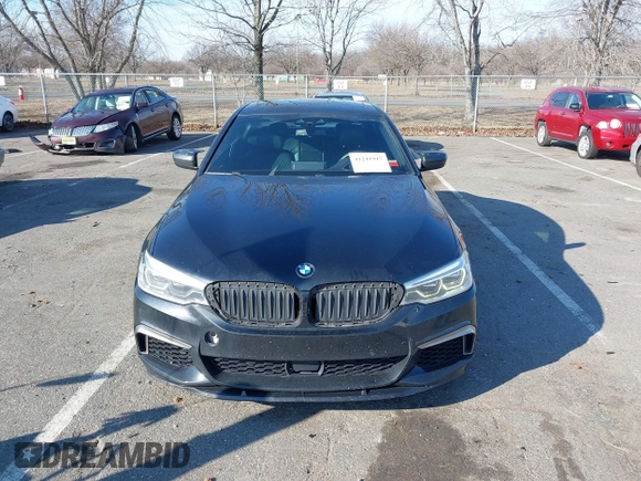 2018 BMW 5 Series M550i xDrive with VIN WBAJB9C55JB049529, listed as a IAAI auction lot 41241917 with 116,265 mi miles and . Bid and sale history available at carsss.com. Image 12.