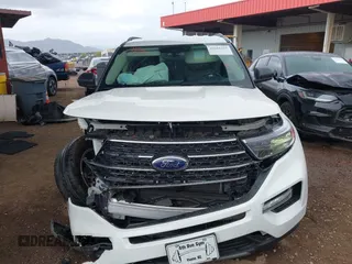 2022 Ford Explorer XLT z VIN 1FMSK7DH0NGB25926, wystawiony jako IAAI lot #42181595 z przebiegiem 15 063 mil mil oraz . Historia ofert i sprzedaży dostępna na DreamBid. Obrazek 6.