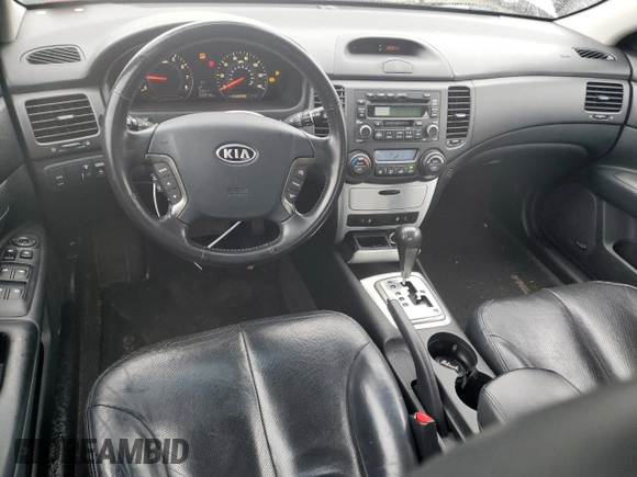 2007 Kia Optima EX with VIN KNAGE124X75120601, listed as a Copart auction lot 83358924 with 168,546 mi miles and Clean Title. Bid and sale history available at carsss.com. Image 8.