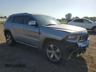 2014 Jeep Grand Cherokee Limited with VIN 1C4RJFBG8EC588284, listed as a Copart auction lot 61684155 with 152,671 mi miles and Salvage title. Bid and sale history available at DreamBid. Image 4.