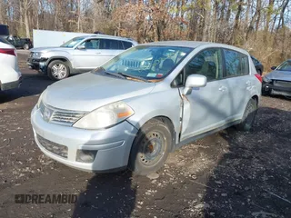 2009 Nissan Versa 1.8 SL with VIN 3N1BC13E19L377436, listed as a IAAI auction lot 41503283 with 149,248 mi miles. Bid and sale history available at carsss.com. Image 2.