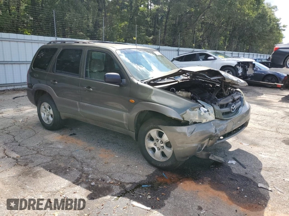 2002 Mazda Tribute LX with VIN 4F2YU09122KM55085, listed as a Copart auction lot 71604184 with 185,158 mi miles and Salvage Title. Bid and sale history available at DreamBid. Image 4.