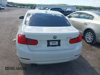 2014 BMW 3 Series 328i with VIN WBA3A5C5XEJ463938, listed as a IAAI auction lot 42103330 with 194,263 mi miles and . Bid and sale history available at DreamBid. Image 16.