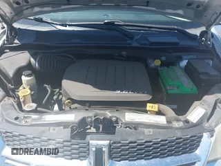 2012 Dodge Grand Caravan SXT with VIN 2C4RDGCG7CR204835, listed as a IAAI auction lot 41948688 with 125,466 mi miles and . Bid and sale history available at DreamBid. Image 10.