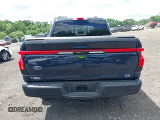 2023 Ford F-150 Lightning Pro с VIN 1FT6W1EVXPWG42428, выставлен на аукционе IAAI как лот 39711091 с пробегом 6 308 миль миль и . История ставок и продаж доступна на DreamBid. Изображение 16.