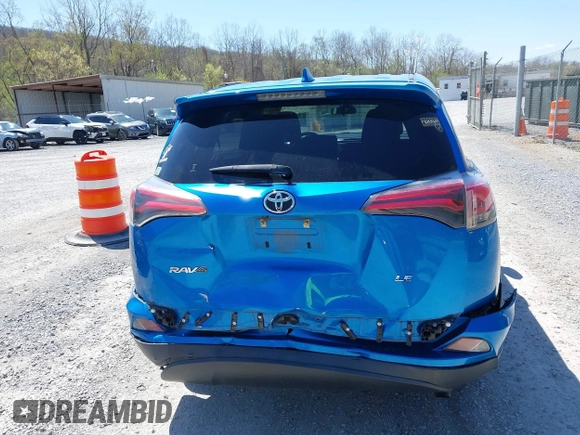 2018 Toyota RAV4 LE with VIN JTMZFREV4JJ734702, listed as a IAAI auction lot 41987540 with 141,526 mi miles. Bid and sale history available at carsss.com. Image 16.