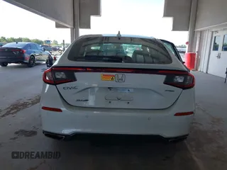 2022 Honda Civic Sport Touring z VIN 19XFL1H8XNE016822, wystawiony jako IAAI lot #42113420 z przebiegiem 30 361 mil mil oraz . Historia ofert i sprzedaży dostępna na DreamBid. Obrazek 16.