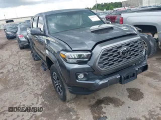 2022 Toyota Tacoma SR5 with VIN 3TMAZ5CN6NM186713, listed as a IAAI auction lot 42607719 with 60,704 mi miles and . Bid and sale history available at DreamBid. Image 1.