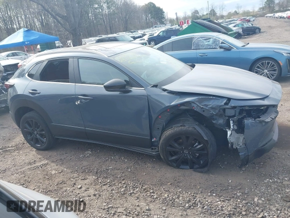2023 Mazda CX-30 S Carbon Edition with VIN 3MVDMBCM8PM502891, listed as a IAAI auction lot 42050533 with 20,035 mi miles and . Bid and sale history available at DreamBid. Image 13.