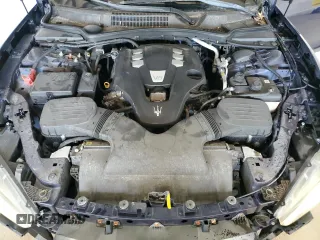 2015 Maserati Ghibli z VIN ZAM57XSA2F1159438, wystawiony jako Copart lot #52530965 z przebiegiem 73 996 mil mil oraz Szkoda całkowita • Salvage title. Historia ofert i sprzedaży dostępna na DreamBid. Obrazek 11.