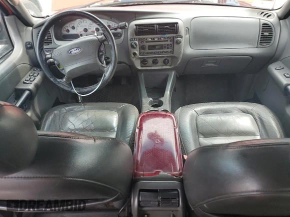 2004 Ford Explorer Sport Trac XLS z VIN 1FMDU77K94UA77644, wystawiony jako Copart lot #57495175 z przebiegiem Nie podano mil oraz Czysty tytuł • Clean title. Historia ofert i sprzedaży dostępna na DreamBid. Obrazek 8.