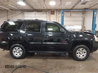 2007 GMC Yukon SLT z VIN 1GKFK13057R417047, wystawiony jako IAAI lot #42061633 z przebiegiem 183 130 mil mil oraz . Historia ofert i sprzedaży dostępna na DreamBid. Obrazek 14.