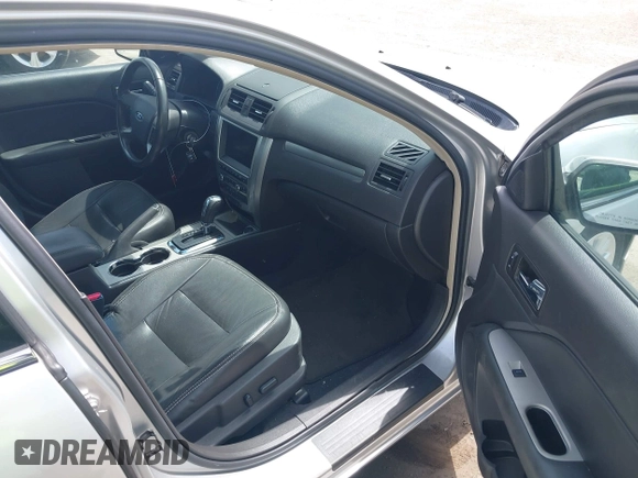 2011 Ford Fusion Hybrid with VIN 3FADP0L38BR249996, listed as a IAAI auction lot 42452194 with 111,316 mi miles and . Bid and sale history available at DreamBid. Image 5.