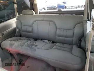 1999 Chevrolet Tahoe with VIN 3GNEC18R1XG143882, listed as a Copart auction lot 42177005 with 130,368 mi miles and Salvage title. Bid and sale history available at DreamBid. Image 11.