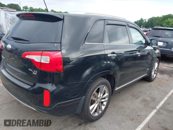 2014 Kia Sorento SX z VIN 5XYKWDA7XEG485405, wystawiony jako IAAI lot #42312938 z przebiegiem 169 728 mil mil oraz . Historia ofert i sprzedaży dostępna na DreamBid. Obrazek 4.