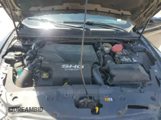 2013 Ford Taurus SHO z VIN 1FAHP2KT7DG133620, wystawiony jako Copart lot #54219005 z przebiegiem Nie podano mil oraz Szkoda całkowita • Salvage title. Historia ofert i sprzedaży dostępna na DreamBid. Obrazek 11.