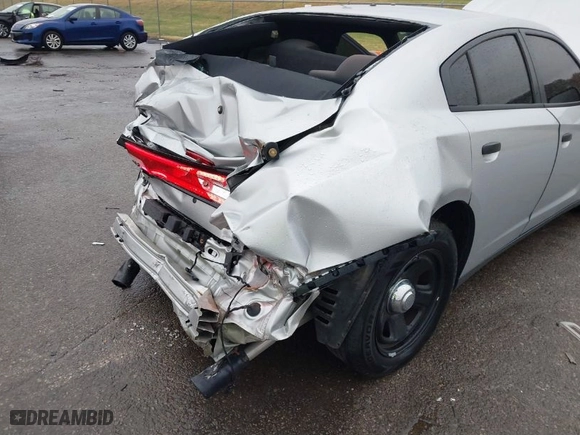 2014 Dodge Charger Police with VIN 2C3CDXAT4EH321968, listed as a IAAI auction lot 40731353 with 69,007 mi miles. Bid and sale history available at carsss.com. Image 19.