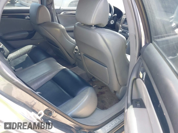 2005 Acura TL with VIN 19UUA66205A061121, listed as a IAAI auction lot 42054185 with 165,097 mi miles. Bid and sale history available at carsss.com. Image 8.
