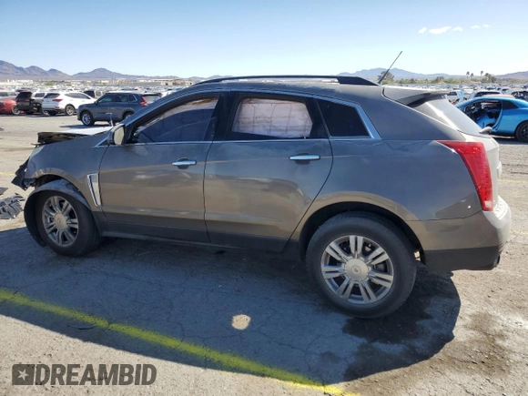 2014 Cadillac SRX z VIN 3GYFNAE37ES609830, wystawiony jako Copart lot #51542955 z przebiegiem 122 560 mil mil oraz Szkoda całkowita • Salvage title. Historia ofert i sprzedaży dostępna na DreamBid. Obrazek 2.