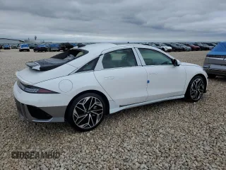 2023 Hyundai Ioniq 6 Limited z VIN KMHM54AA2PA052554, wystawiony jako Copart lot #74362523 z przebiegiem 5 mil mil oraz . Historia ofert i sprzedaży dostępna na DreamBid. Obrazek 3.