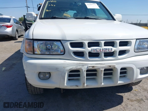 2001 Isuzu Rodeo S with VIN 4S2CK58W614332181, listed as a IAAI auction lot 42585130 with 196,497 mi miles and . Bid and sale history available at DreamBid. Image 6.