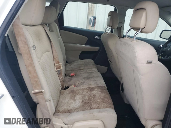 2014 Dodge Journey American Value with VIN 3C4PDCAB3ET216889, listed as a Copart auction lot 60874265 with 117,508 mi miles and Salvage title. Bid and sale history available at DreamBid. Image 11.