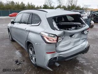 2016 BMW X1 xDrive28i with VIN WBXHT3C3XG5E51358, listed as a IAAI auction lot 41730597 with 90,010 mi miles. Bid and sale history available at carsss.com. Image 3.
