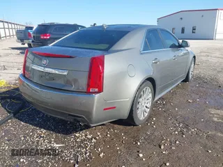 2011 Cadillac CTS Performance with VIN 1G6DK5ED6B0156490, listed as a IAAI auction lot 41346869 with 145,627 mi miles and . Bid and sale history available at DreamBid. Image 4.