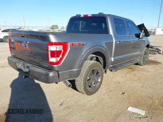 2021 Ford F-150 XL with VIN 1FTFW1E8XMFB77980, listed as a IAAI auction lot 41695579 with 42,802 mi miles. Bid and sale history available at carsss.com. Image 4.