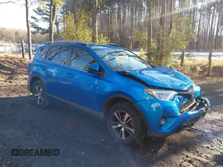 2018 Toyota RAV4 XLE with VIN JTMWFREV5JJ738017, listed as a IAAI auction lot 41298911 with 96,558 mi miles and . Bid and sale history available at DreamBid. Image 1.