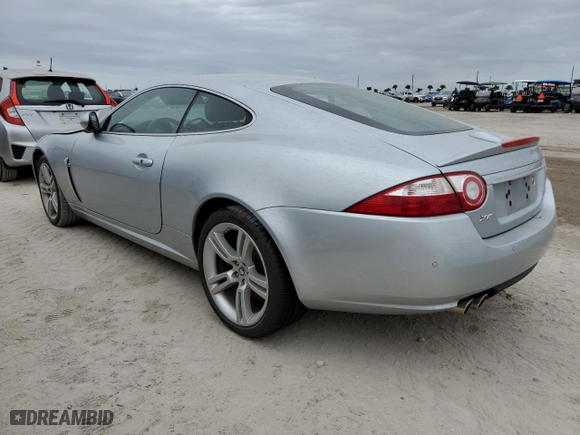 2007 Jaguar XK with VIN SAJWA43C979B19440, listed as a Copart auction lot 76762184 with 0 mi miles and Salvage Title. Bid and sale history available at carsss.com. Image 2.
