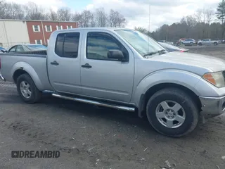 2008 Nissan Frontier LE z VIN 1N6AD09W18C435584, wystawiony jako IAAI lot #41998922 z przebiegiem 154 507 mil mil oraz . Historia ofert i sprzedaży dostępna na DreamBid. Obrazek 13.