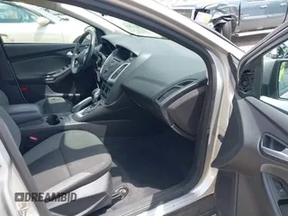 2014 Ford Focus SE with VIN 1FADP3F28EL162669, listed as a IAAI auction lot 42128555 with 104,265 mi miles and . Bid and sale history available at carsss.com. Image 5.