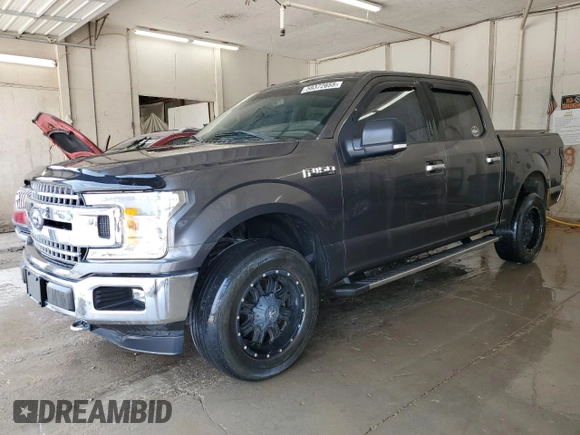 2018 Ford F-150 XL with VIN 1FTEW1E51JFD24037, listed as a Copart auction lot 59372655 with 98,465 mi miles and Salvage title. Bid and sale history available at DreamBid. Image 1.