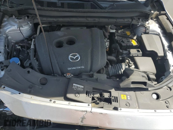 2020 Mazda CX-5 Touring z VIN JM3KFBCM2L1824072, wystawiony jako Copart lot #54825295 z przebiegiem 99 420 mil mil oraz Szkoda całkowita • Salvage title. Historia ofert i sprzedaży dostępna na DreamBid. Obrazek 12.